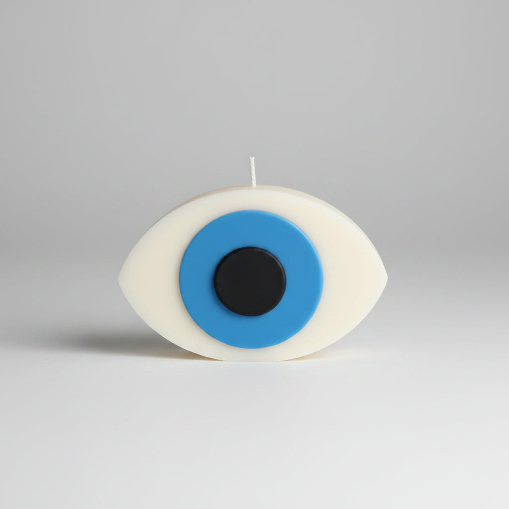 Bougie parfumée artisanale oeil sur fond blanc