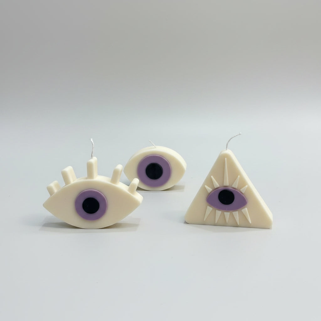 Bougie parfumée artisanale Oeil Violet sur fond blanc
