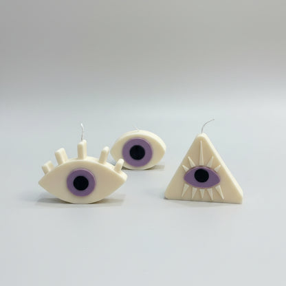 Bougie parfumée artisanale Oeil Violet sur fond blanc
