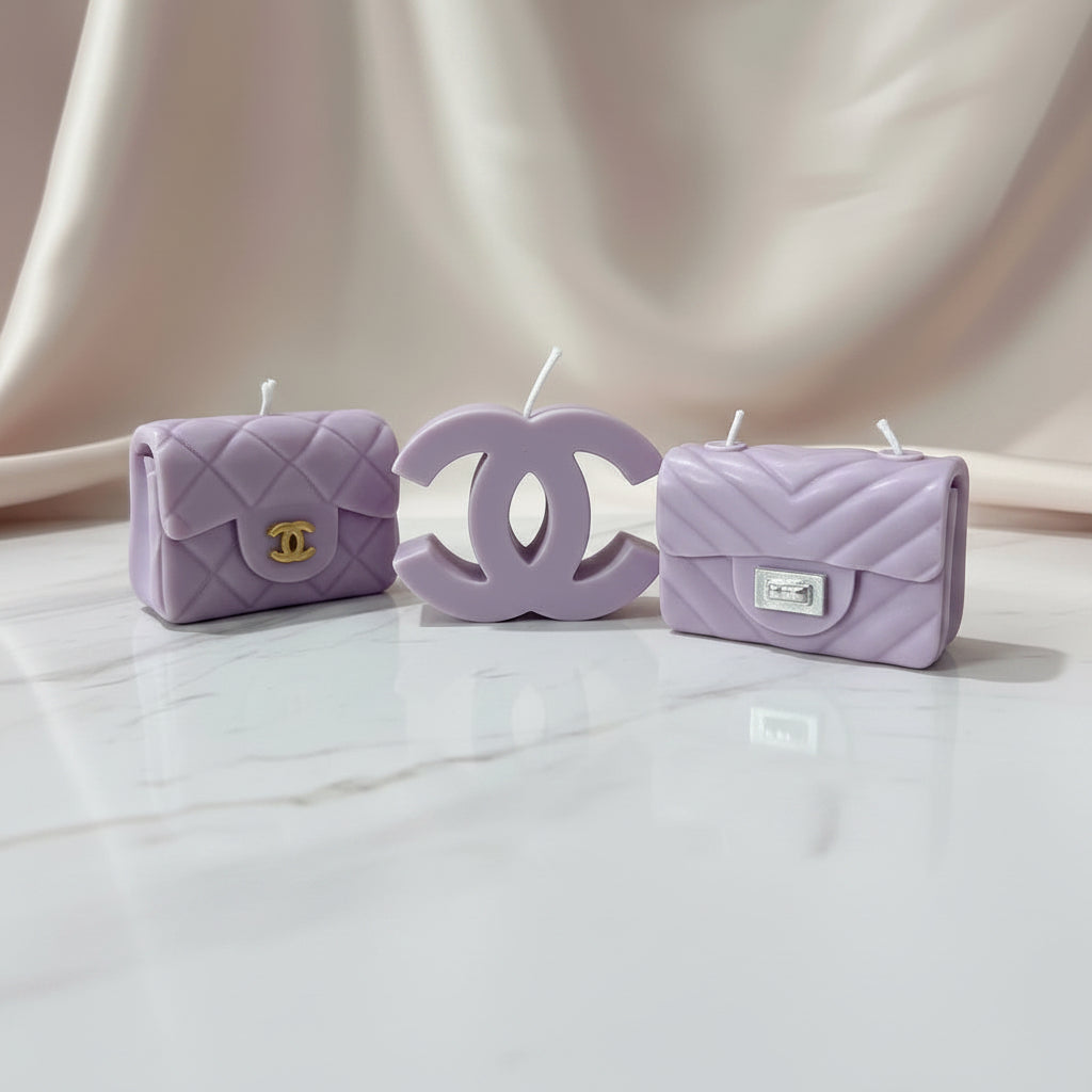 Bougie parfumée artisanale forme sac
et logo violet
